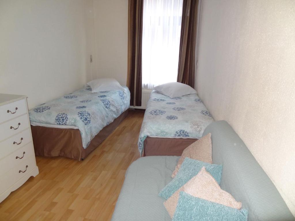 Logies Ocelot Hotell Oostende Rum bild