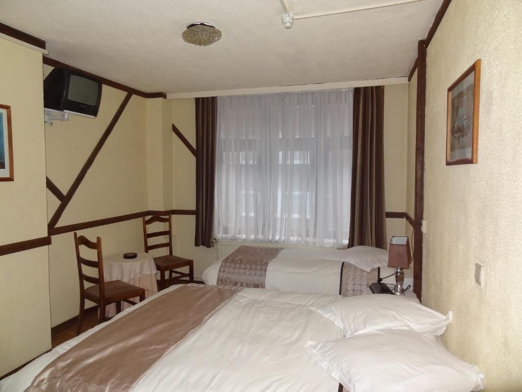 Logies Ocelot Hotell Oostende Rum bild